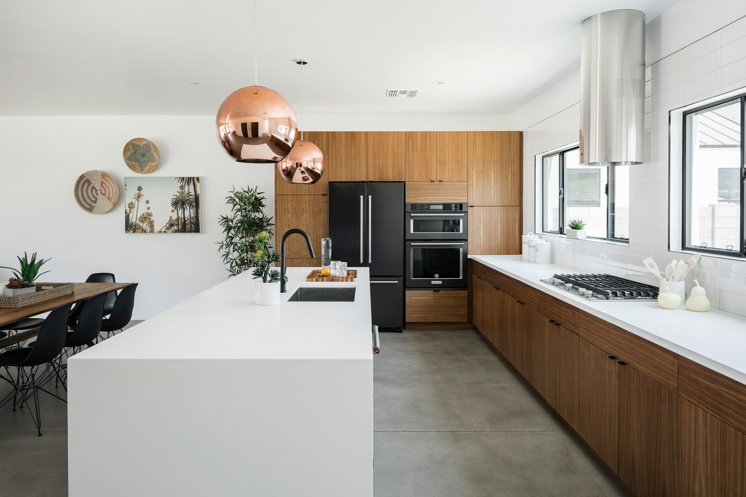 Modern home features all custom American Walnut cabinets and White Quartz counter-tops in Phoenix, AZ