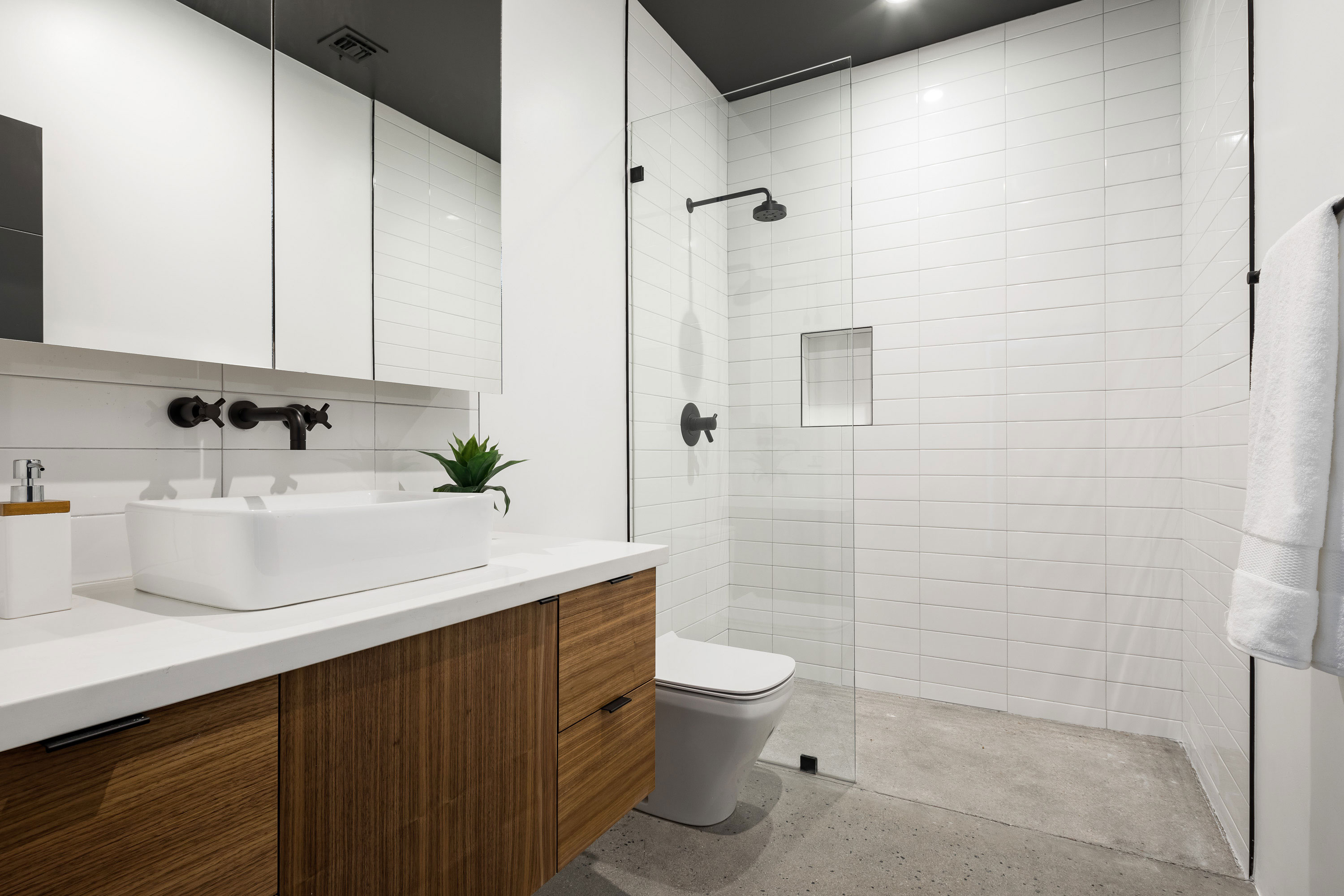 Modern Bathroom with white tile in shower built in Phoenix Historic District