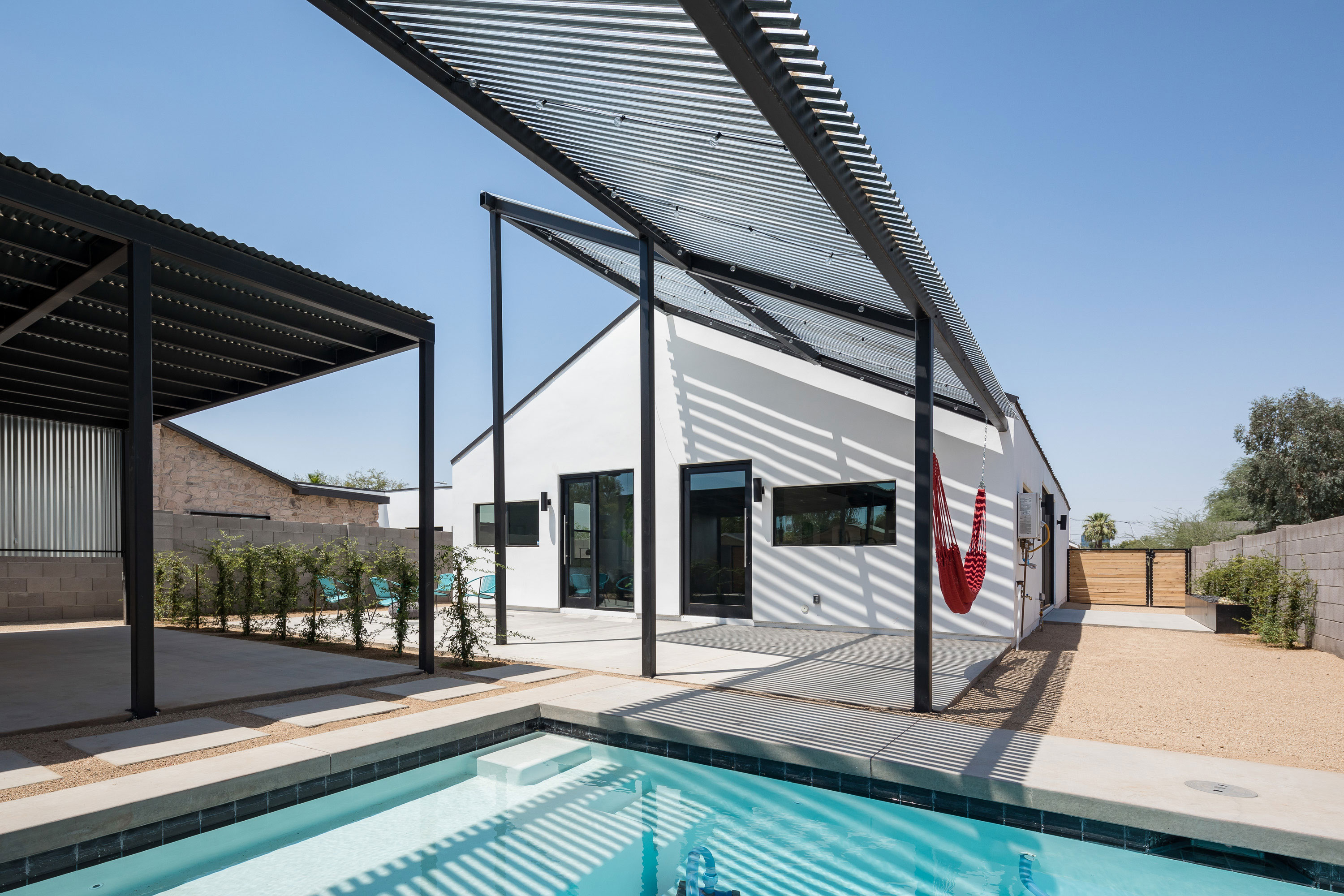 Modern pool with baja step in Phoenix, AZ