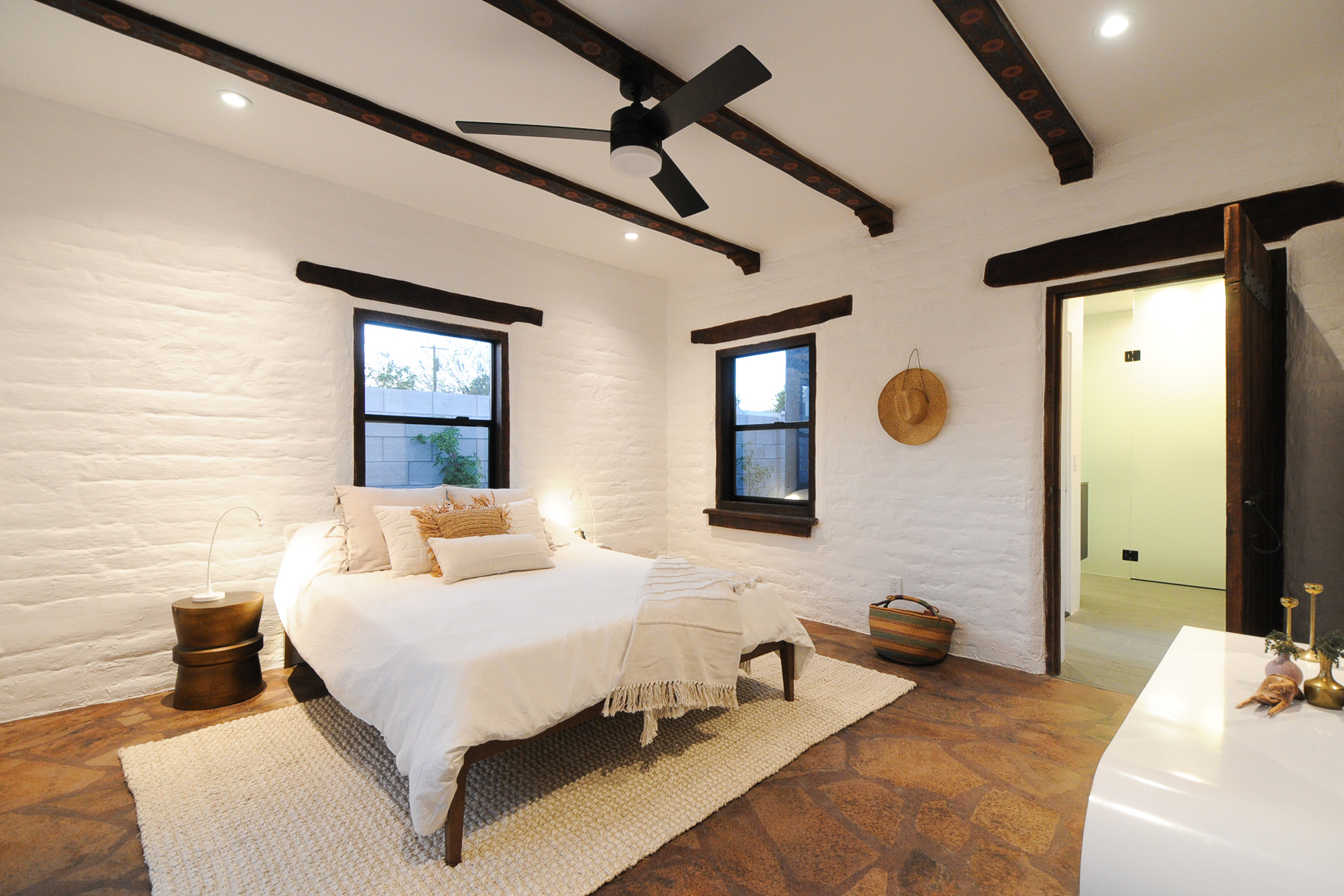 Modern master suite with ceiling wood beams in Historic Phoenix, AZ